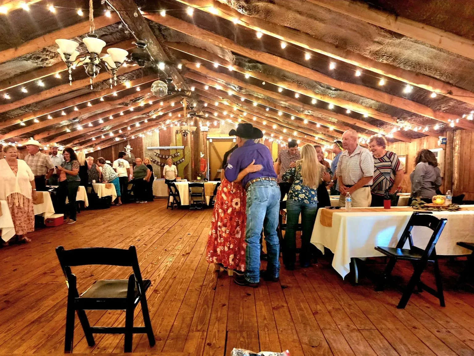 Birthday party celebration inside the rustic barn
