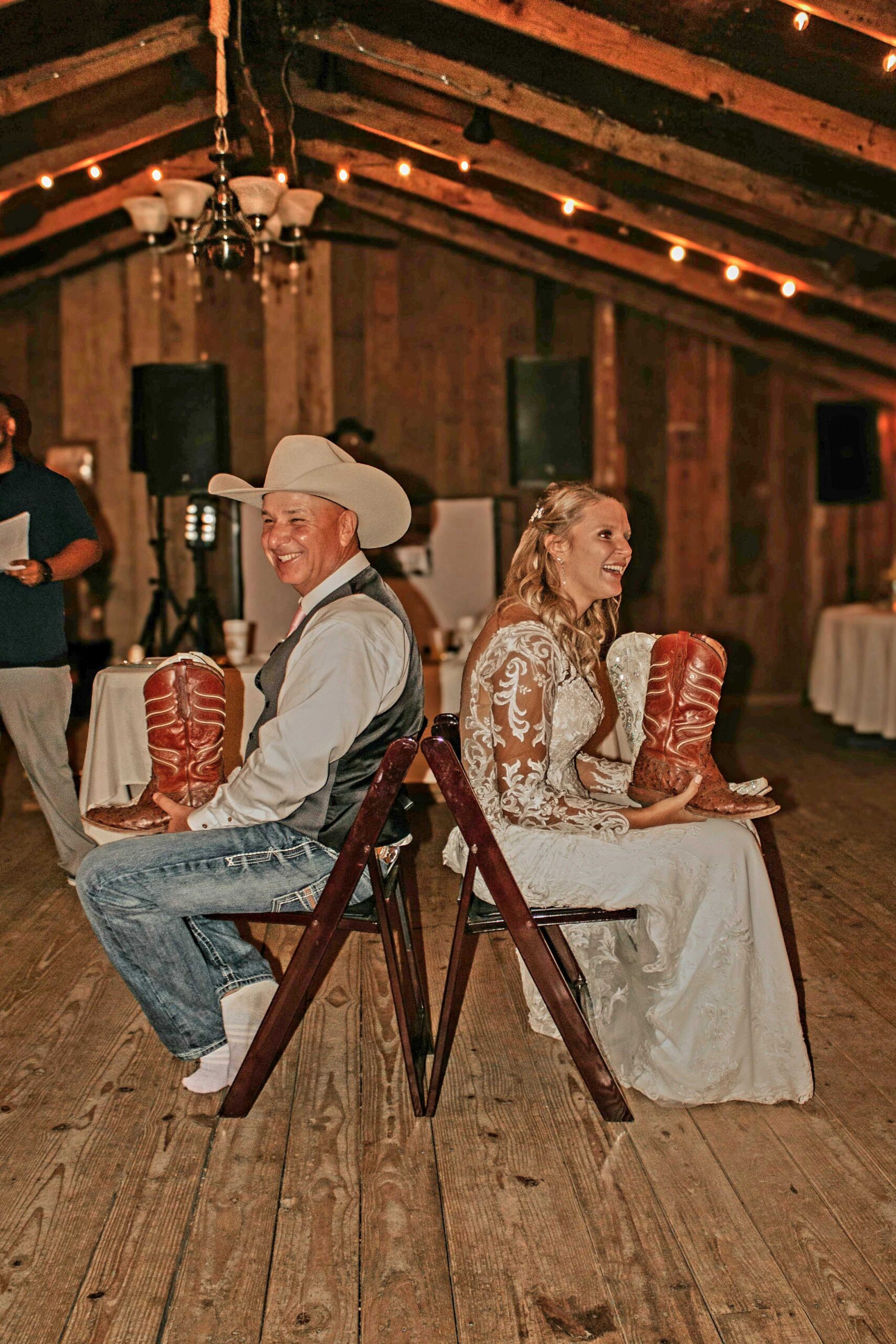 Wedding shoe game during a barn reception
