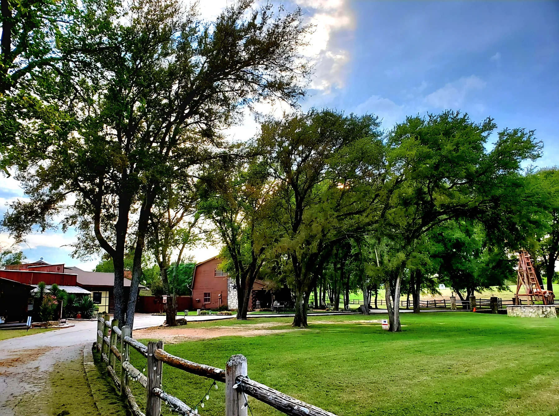 Tree-lined grounds at Chisholm Trail Rustic Venue