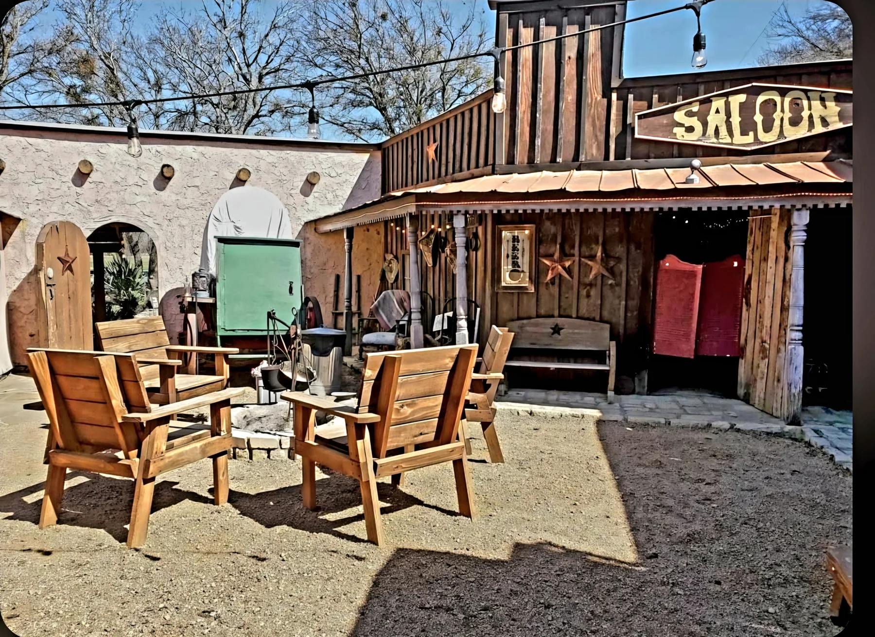 Outdoor saloon seating area at Chisholm Trail Rustic Venue